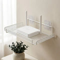 Étagère de rangement blanche pour routeur, avec structure métallique ajourée.