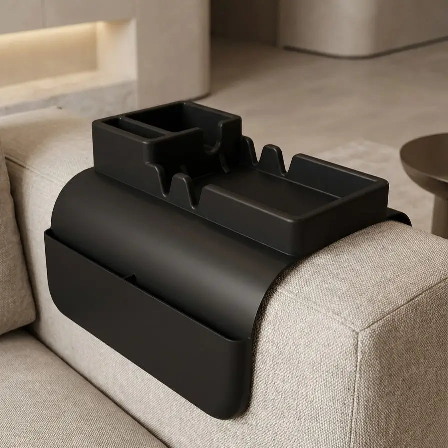 Organiseur pour accoudoir de canapé Canopée, couleur noire, avec support pour téléphone portable et porte-verres.